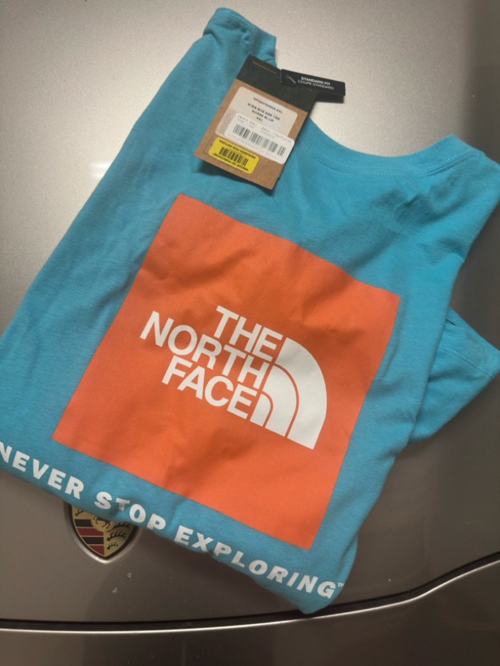 The North Face Kids Blue Short-Sleeve Tee with Orange Logo Square